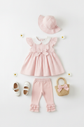 Girls pastel pink cotton ruffle leggings styled with matching pink gingham flutter sleeve dress
